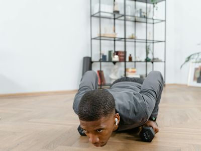 Close-up of a person's focused expression during a calm exercise routine.